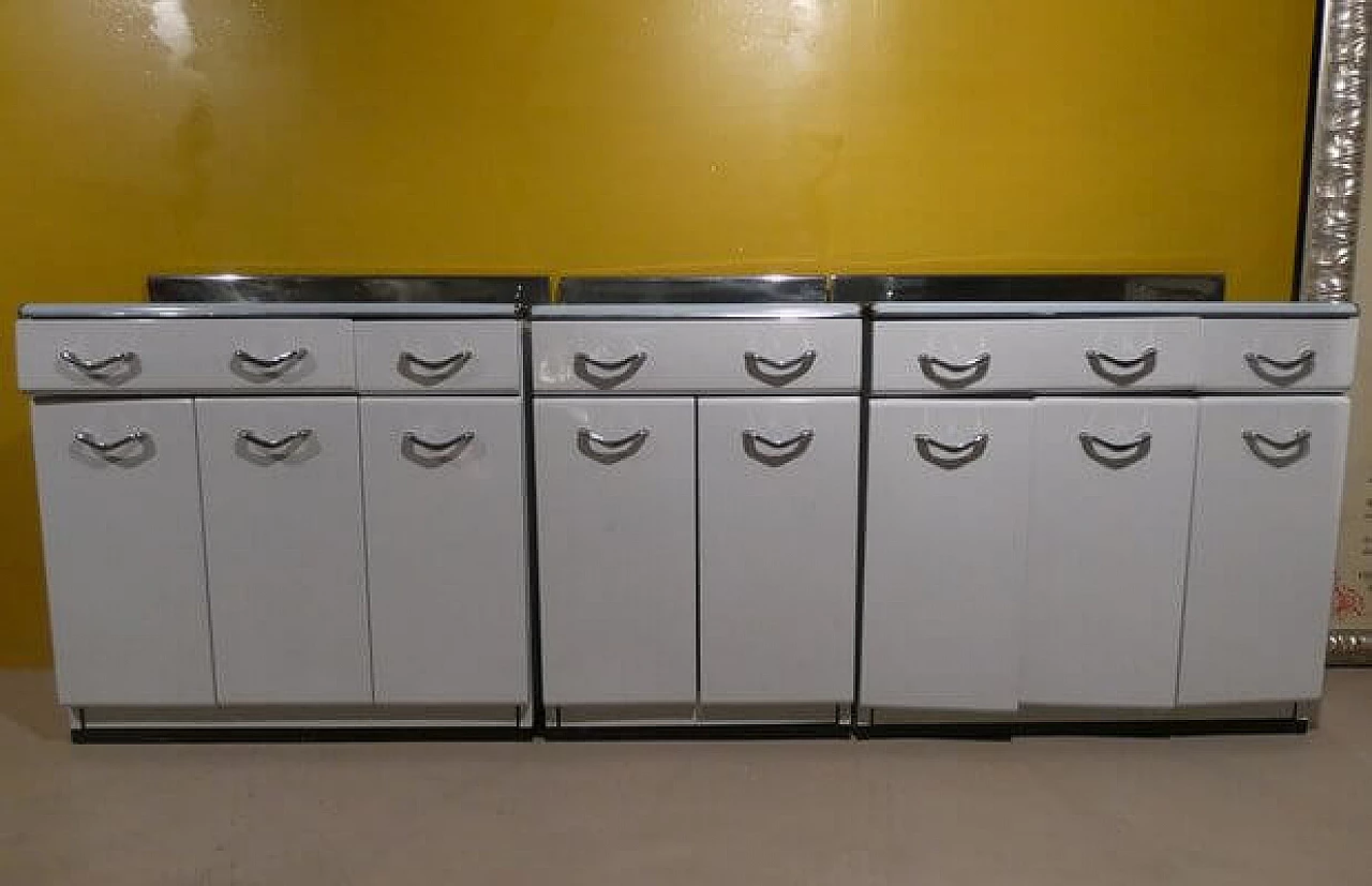 3 White enamelled metal storage cabinets, 1960s 1