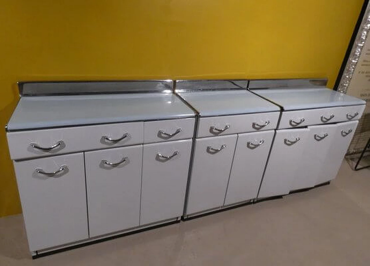 3 White enamelled metal storage cabinets, 1960s 2