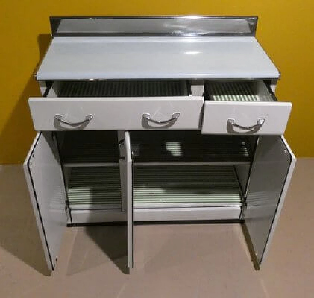 3 White enamelled metal storage cabinets, 1960s 18