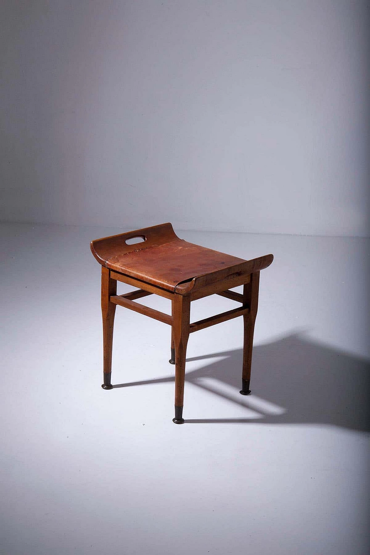 Wood and leather stool, 1950s 4
