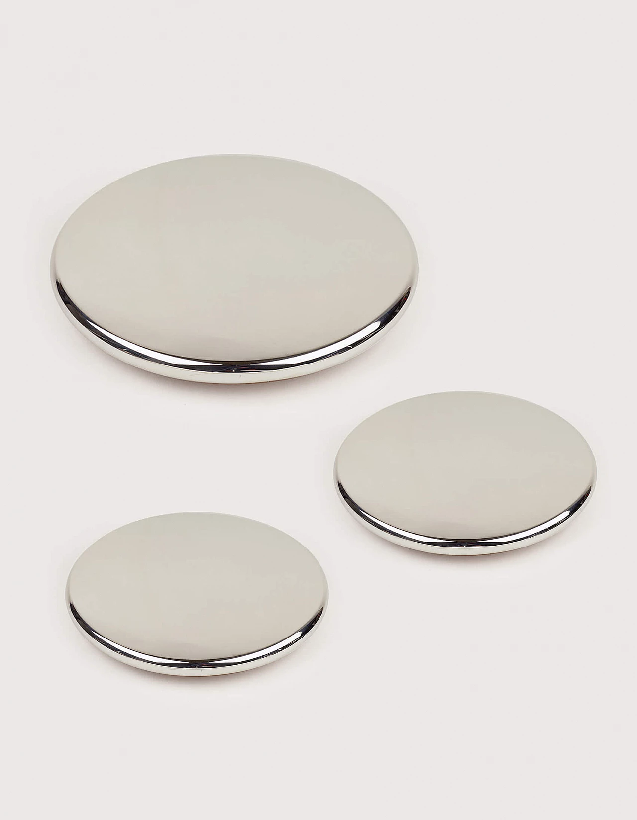 3 Revolving trays in wood and silver 1