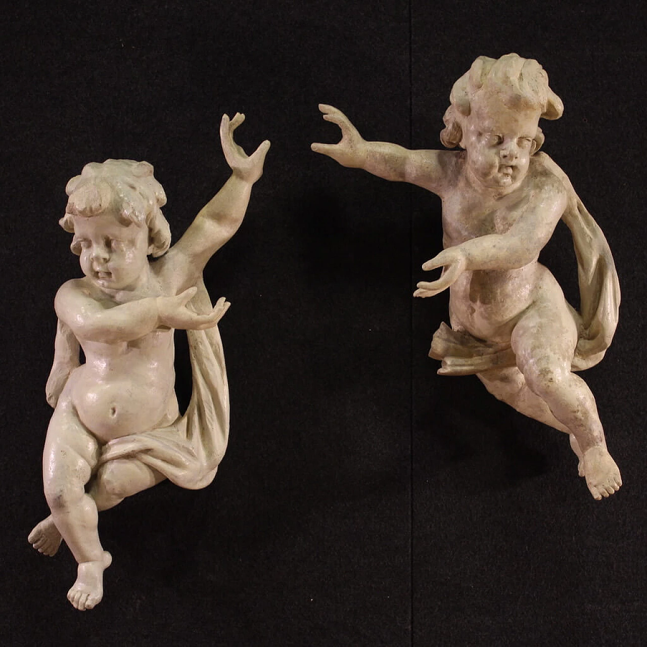 Pair of painted wooden sculptures of putti, 18th century 1