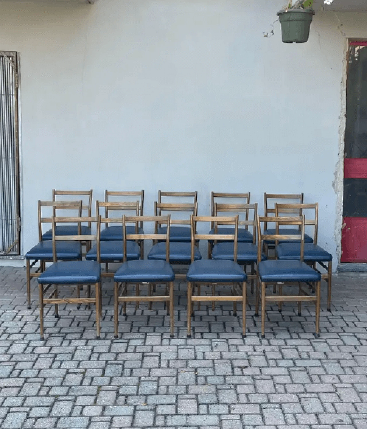 14 Dining chairs in wood and blue leather by Gio Ponti, 1970s 6