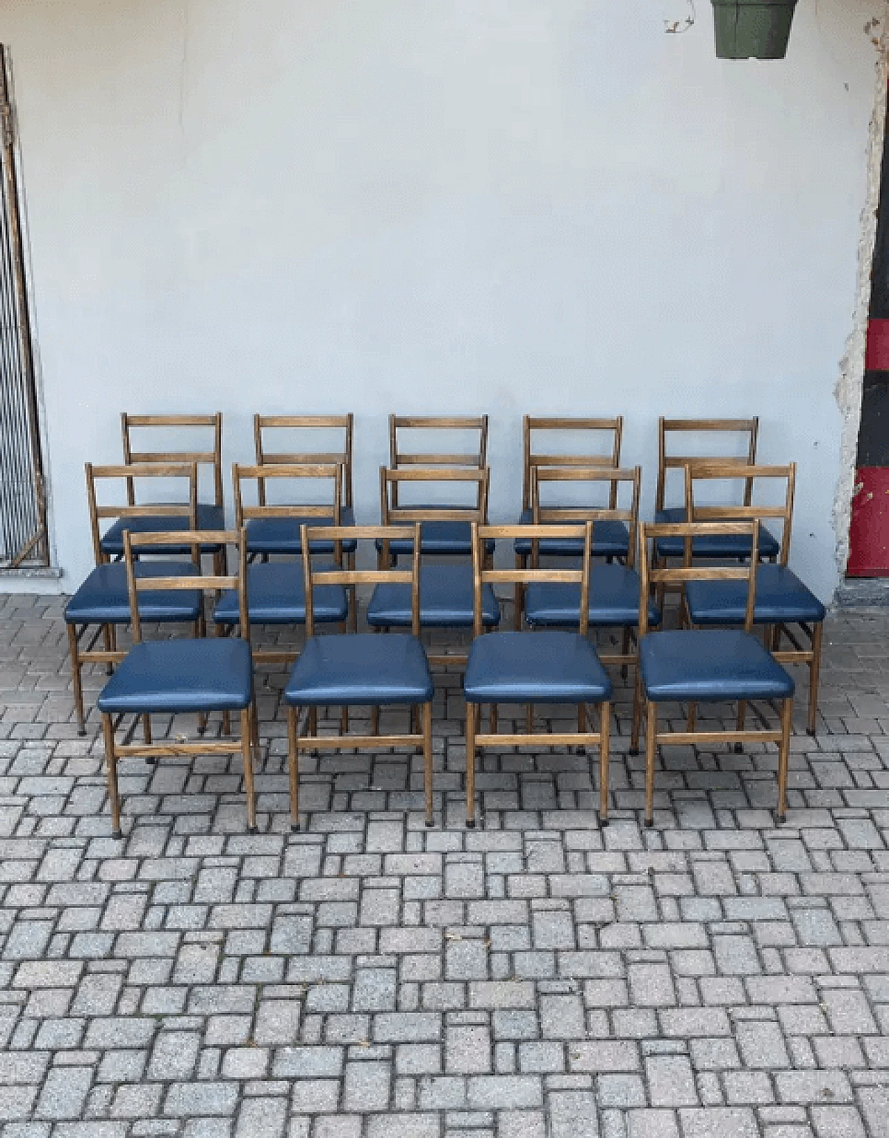 14 Dining chairs in wood and blue leather by Gio Ponti, 1970s 7