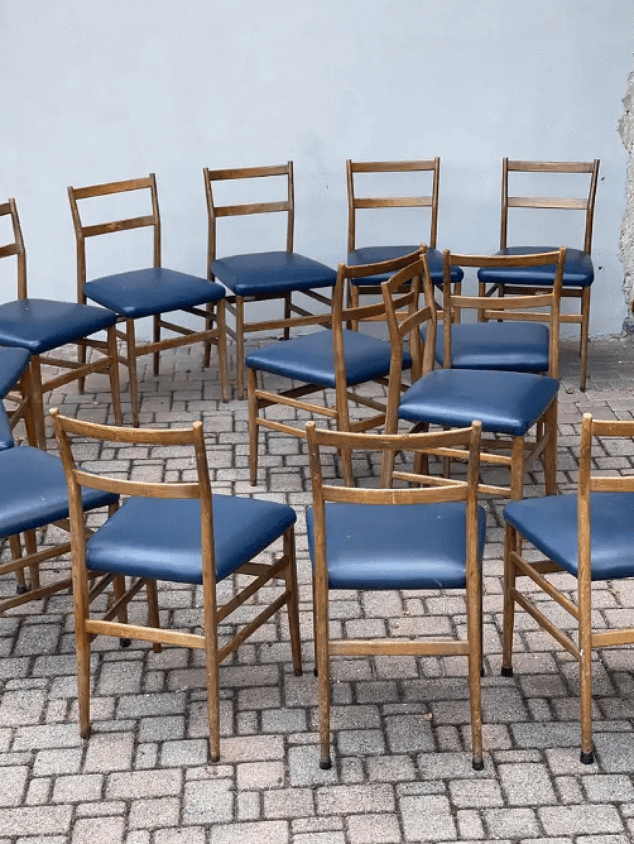 14 Dining chairs in wood and blue leather by Gio Ponti, 1970s 8