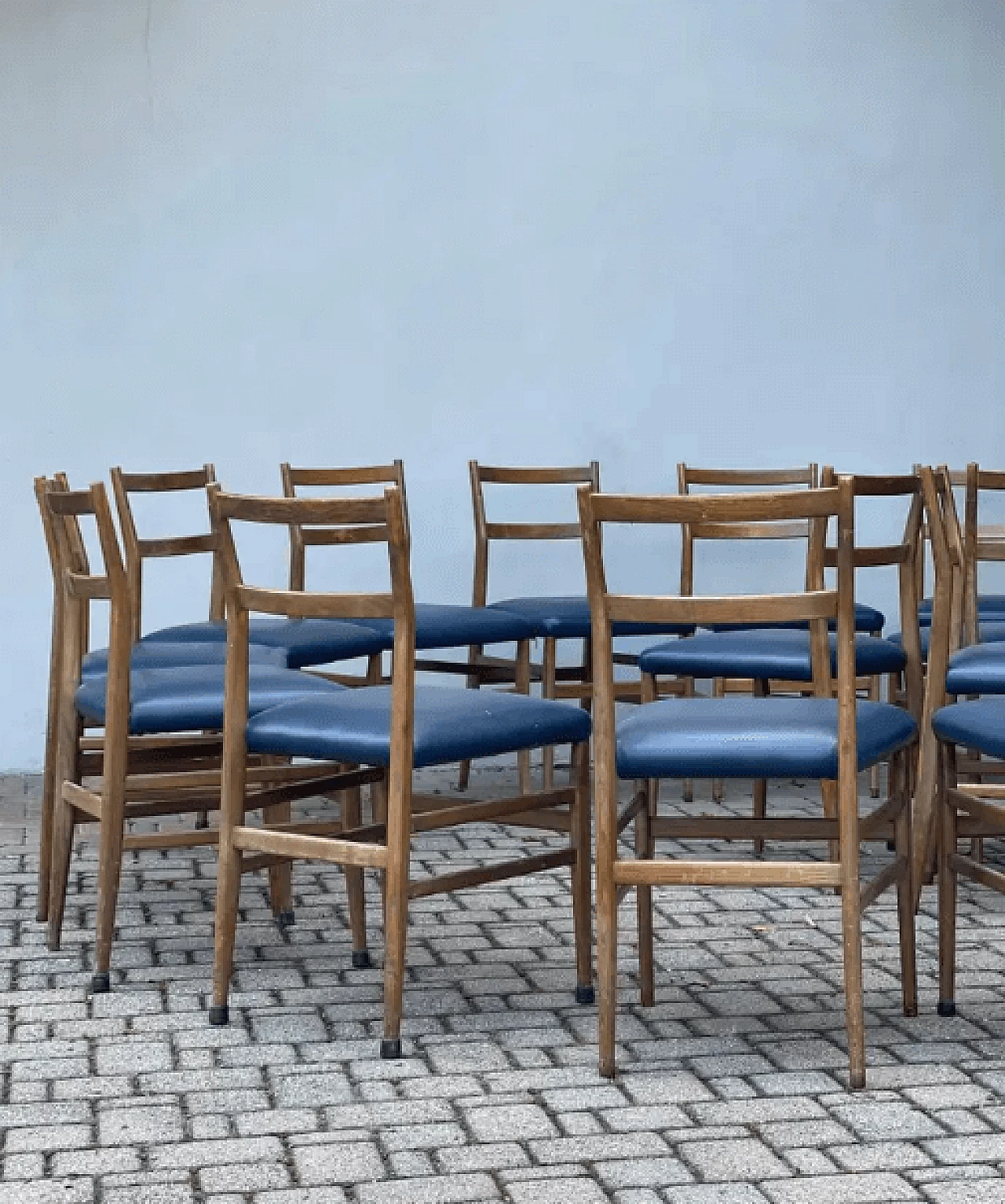 14 Dining chairs in wood and blue leather by Gio Ponti, 1970s 9