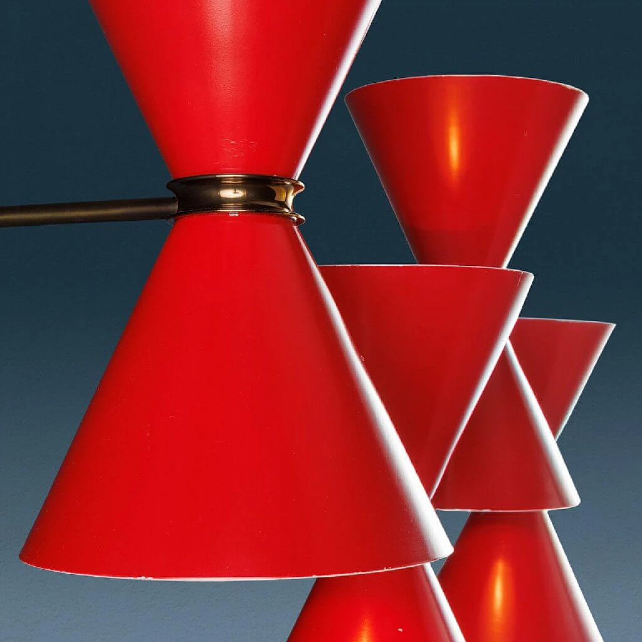 4 Enamelled red metal and brass wall lamps, 1960s 6