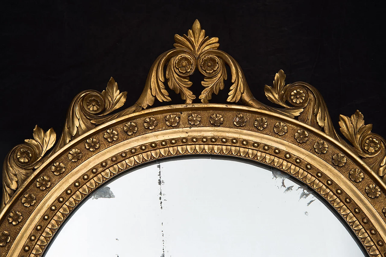 Specchiera Impero napoletana di forma ovale in legno dorato e intagliato, inizio '800 3