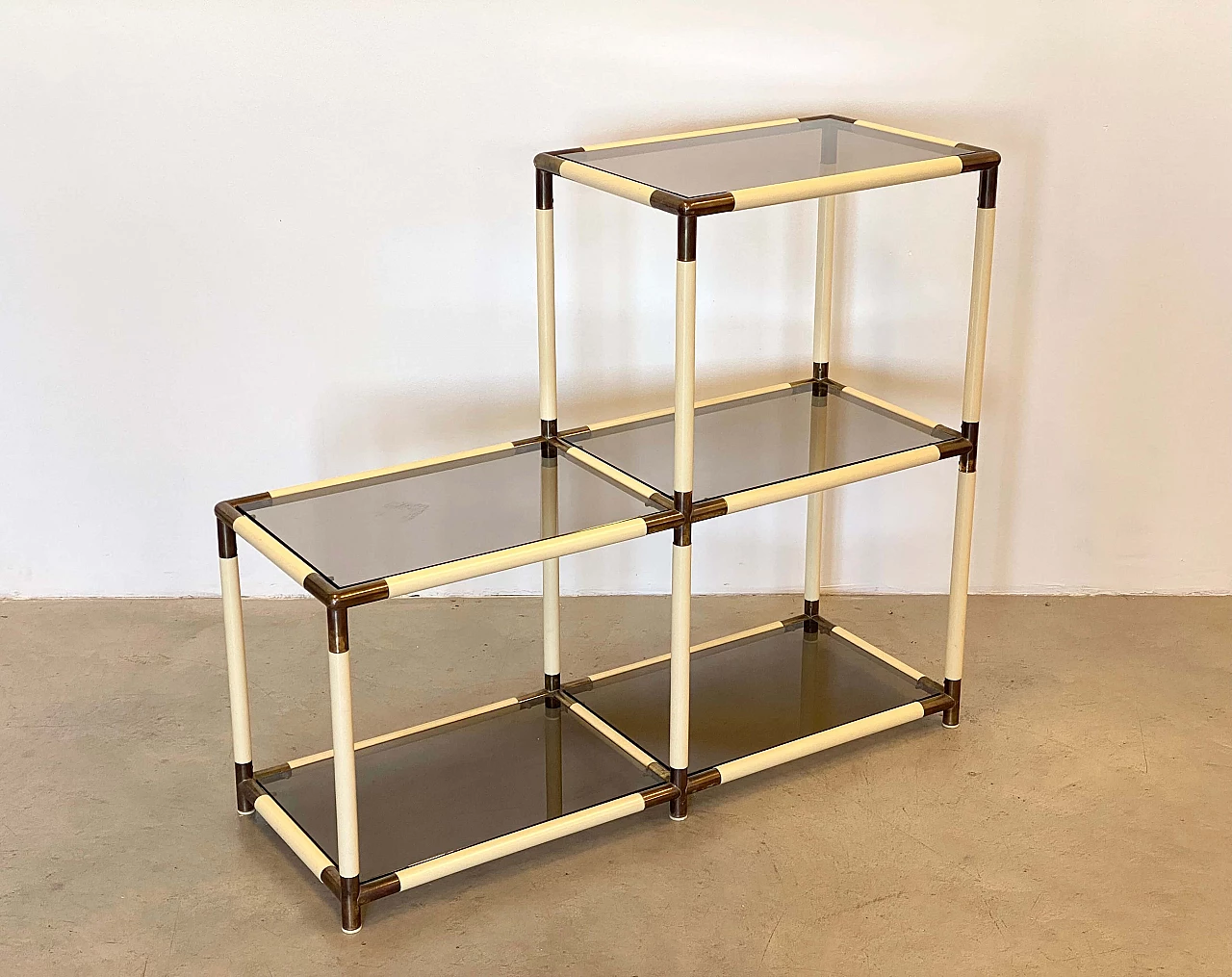 Ivory shelf unit in pvc with brass details and smoked glass shelves by Banci, 1970s 3
