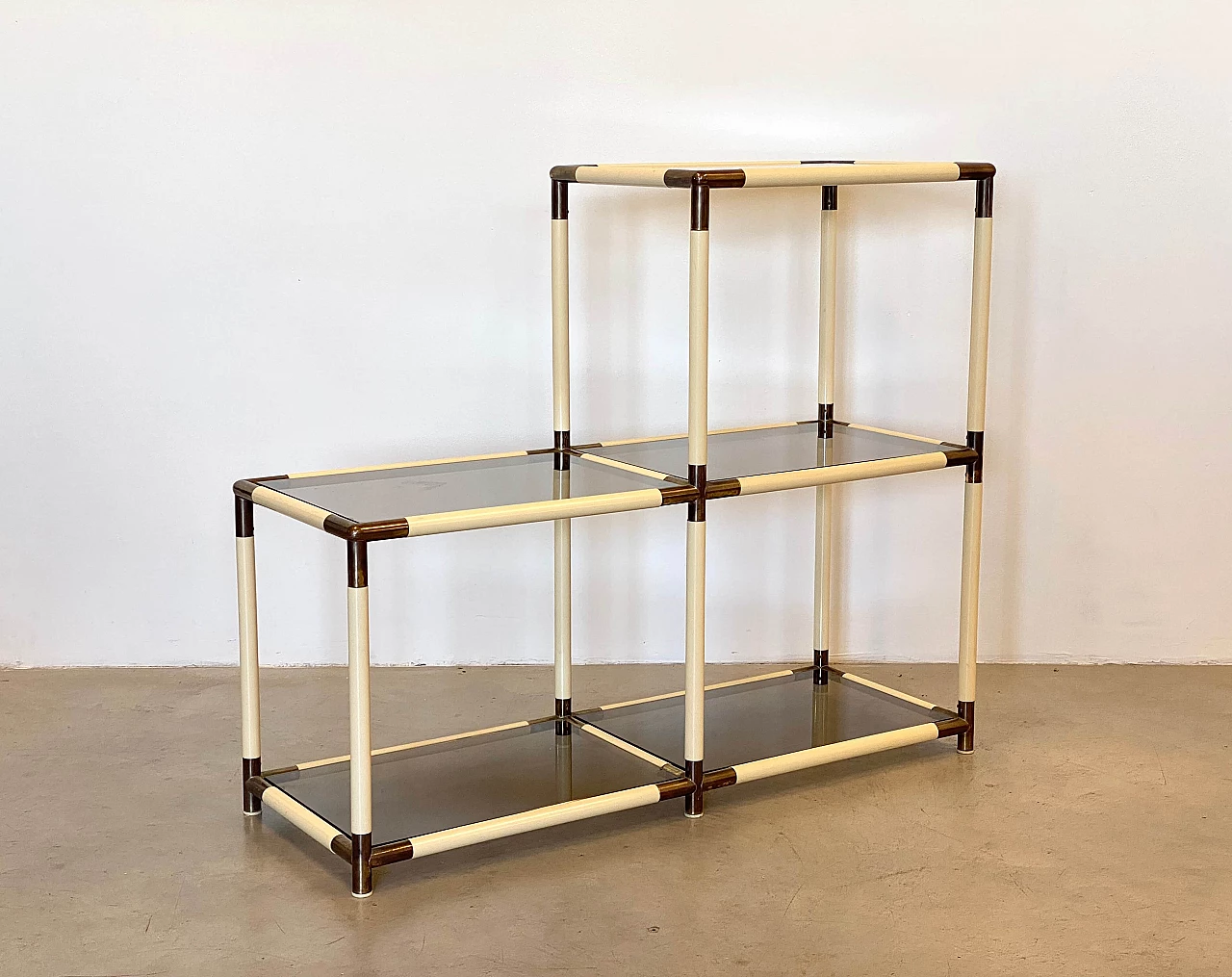 Ivory shelf unit in pvc with brass details and smoked glass shelves by Banci, 1970s 6