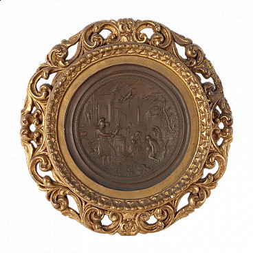 Copper roundel with gilded pastiglia frame, 19th century