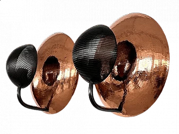Pair of hammered copper and black perforated metal wall lights, 1970s