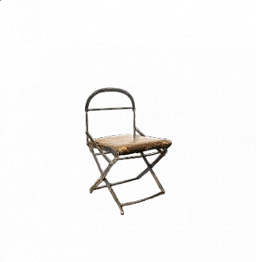 Foldable chair with metal frame and leather upholstery, early 20th century