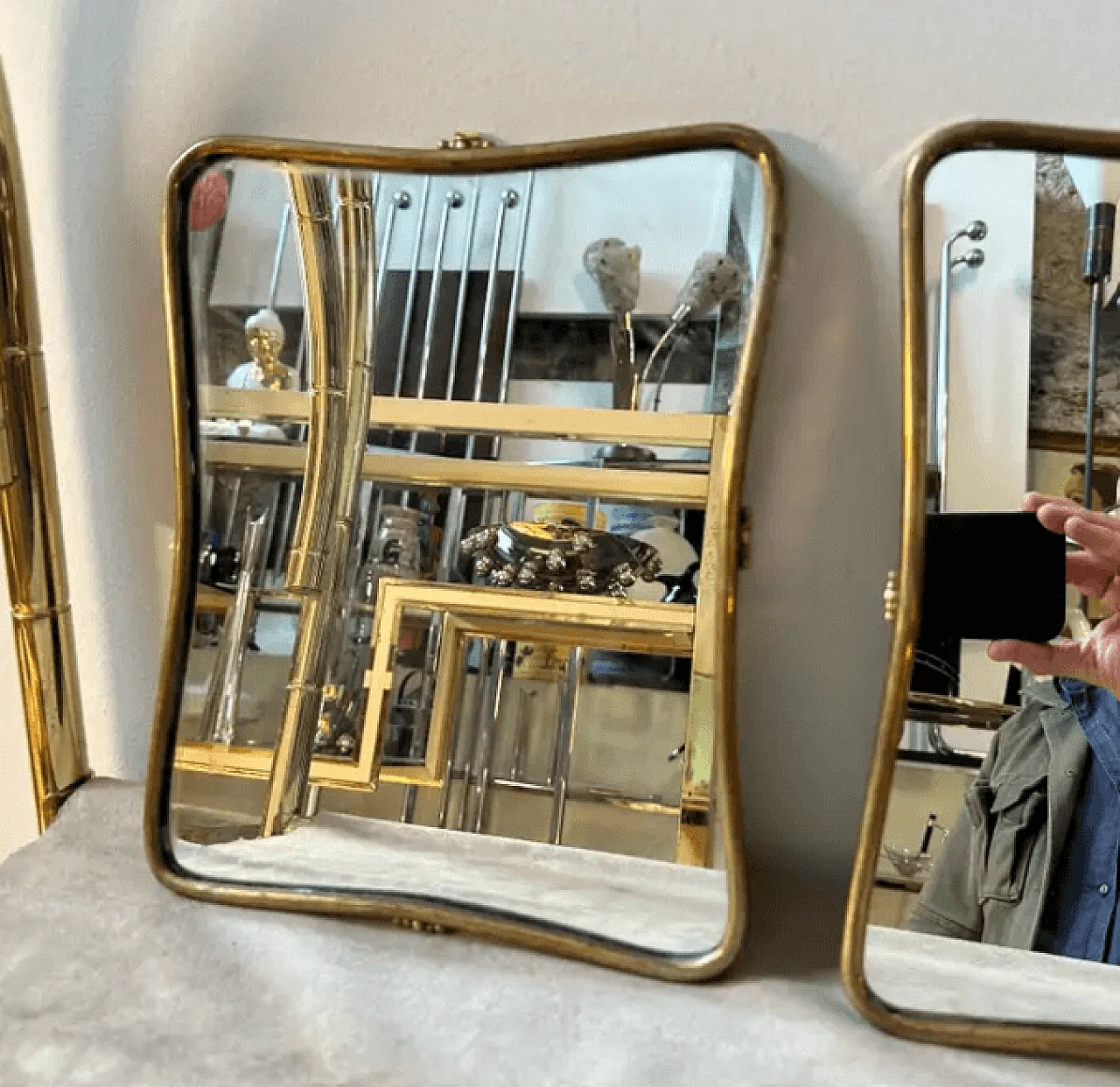 Pair of small brass wall mirrors in the style of Gio Ponti, 1950s 2