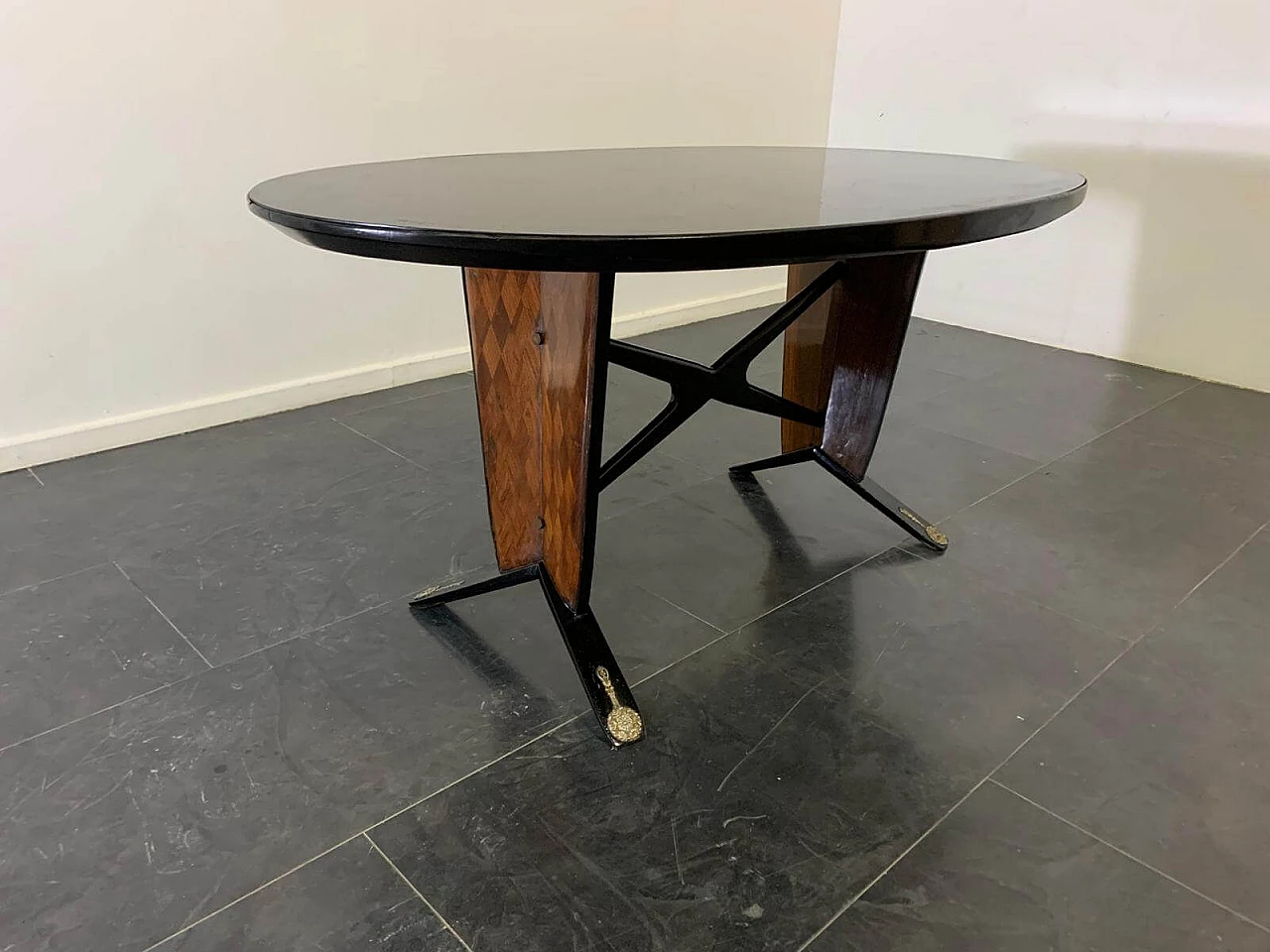Oval ebonized wood, mahogany and black glass table, 1950s 1