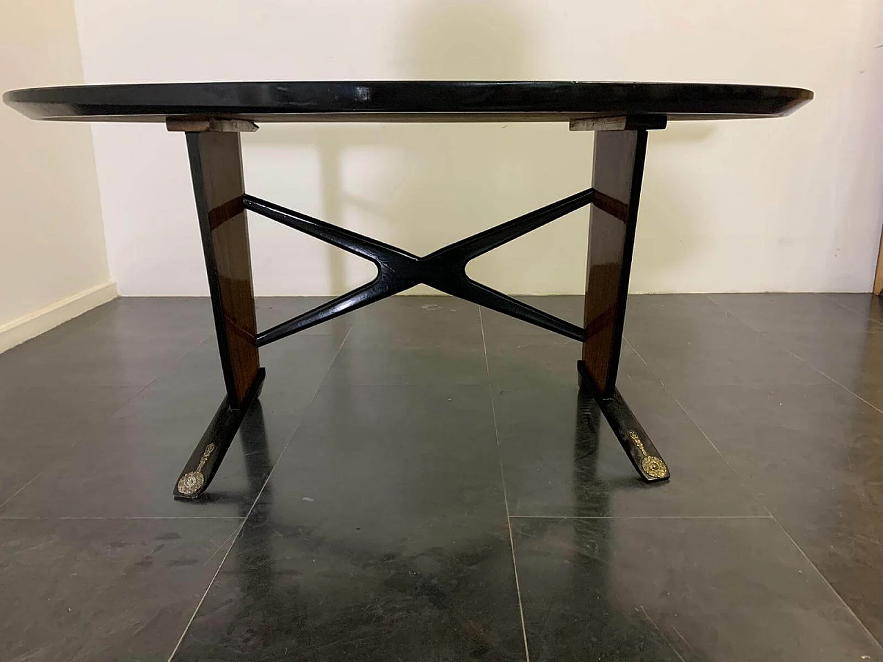 Oval ebonized wood, mahogany and black glass table, 1950s 3