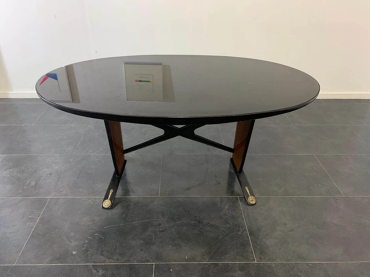 Oval ebonized wood, mahogany and black glass table, 1950s 4
