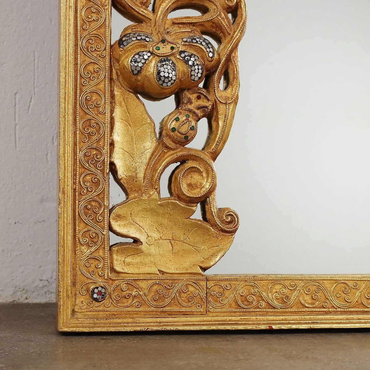 Oriental-style mirror carved with phytomorphic and floral motifs 10