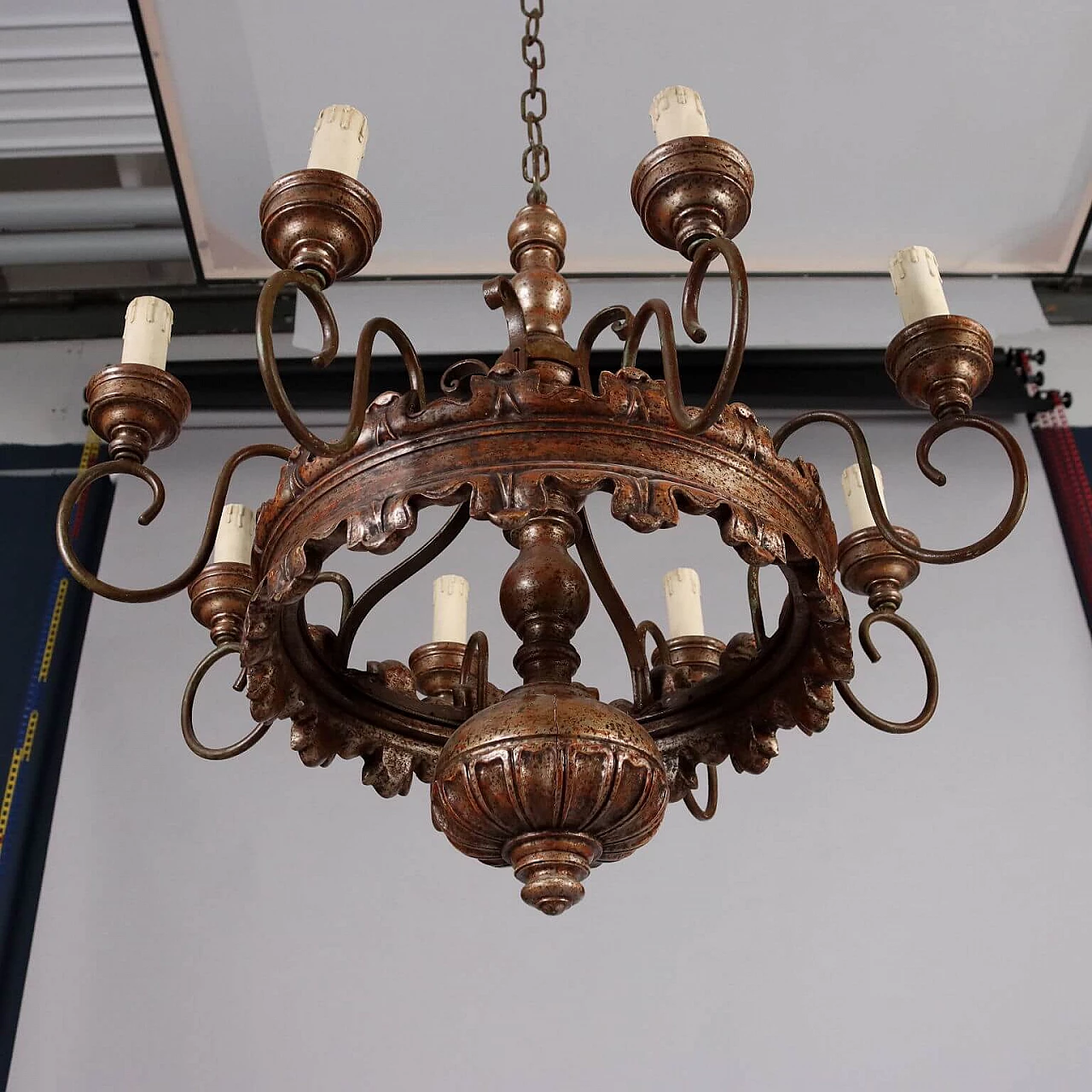 Turned wooden chandelier with eight metal arms 9