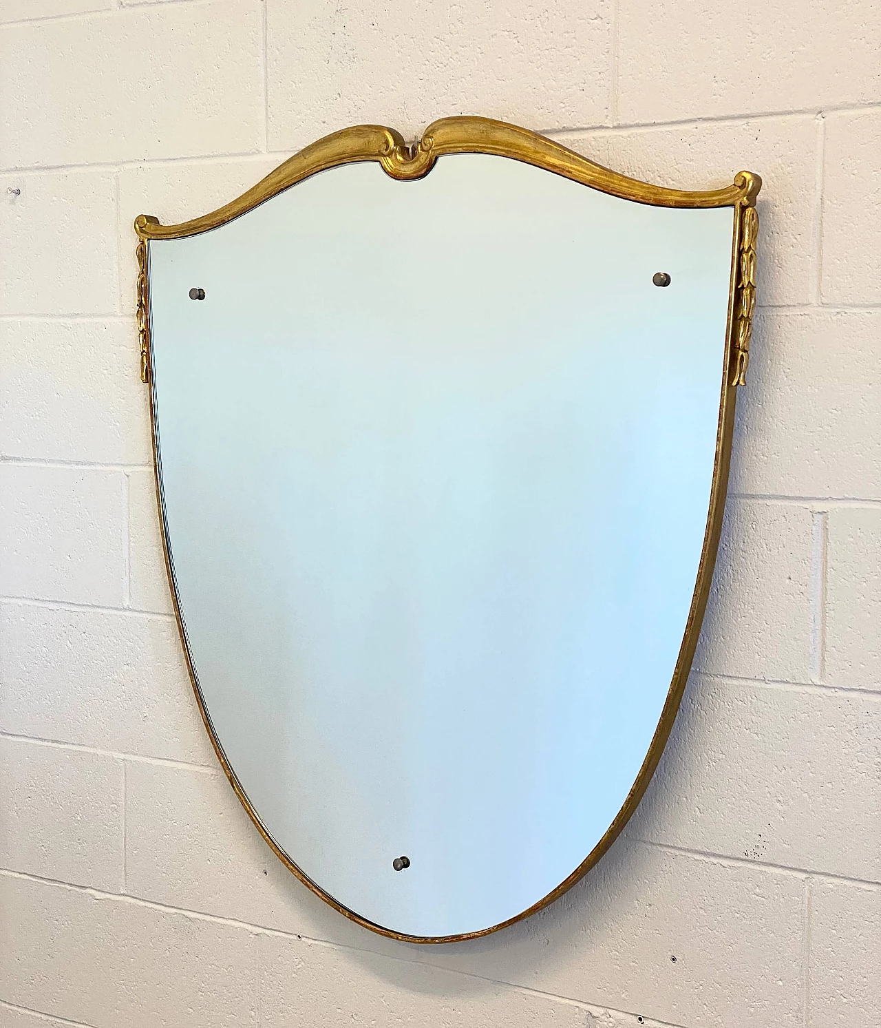 Shield-shaped mirror with gilded wooden frame, 1960s 11