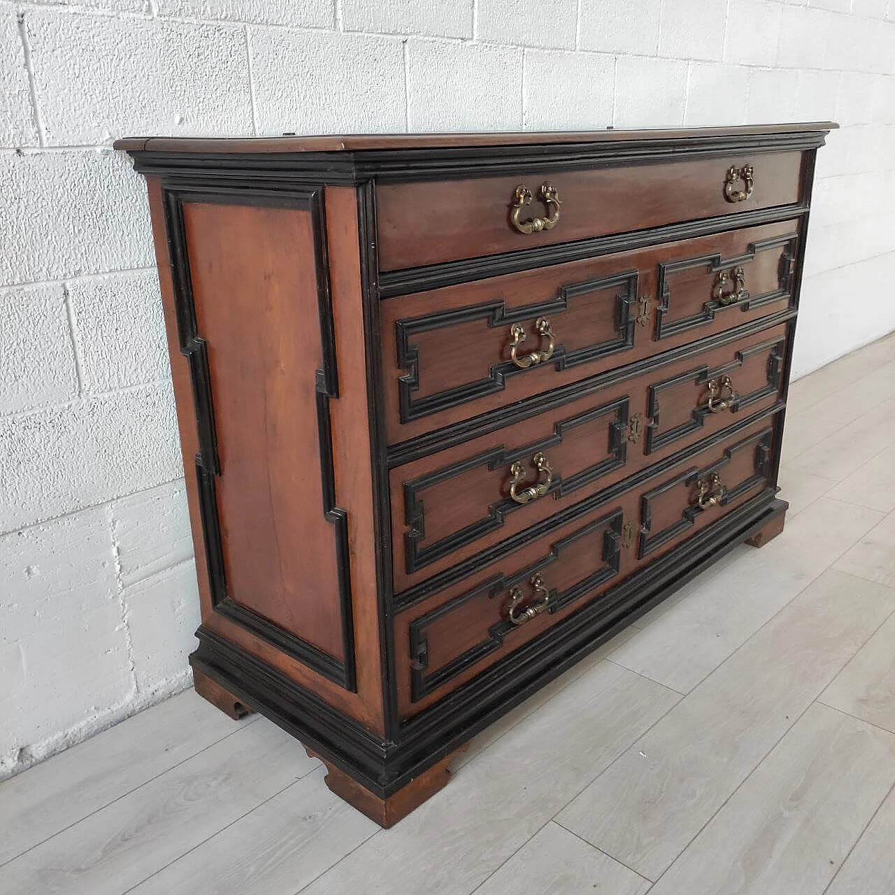 Emilian walnut canterano with ebonized details, early 18th century 2