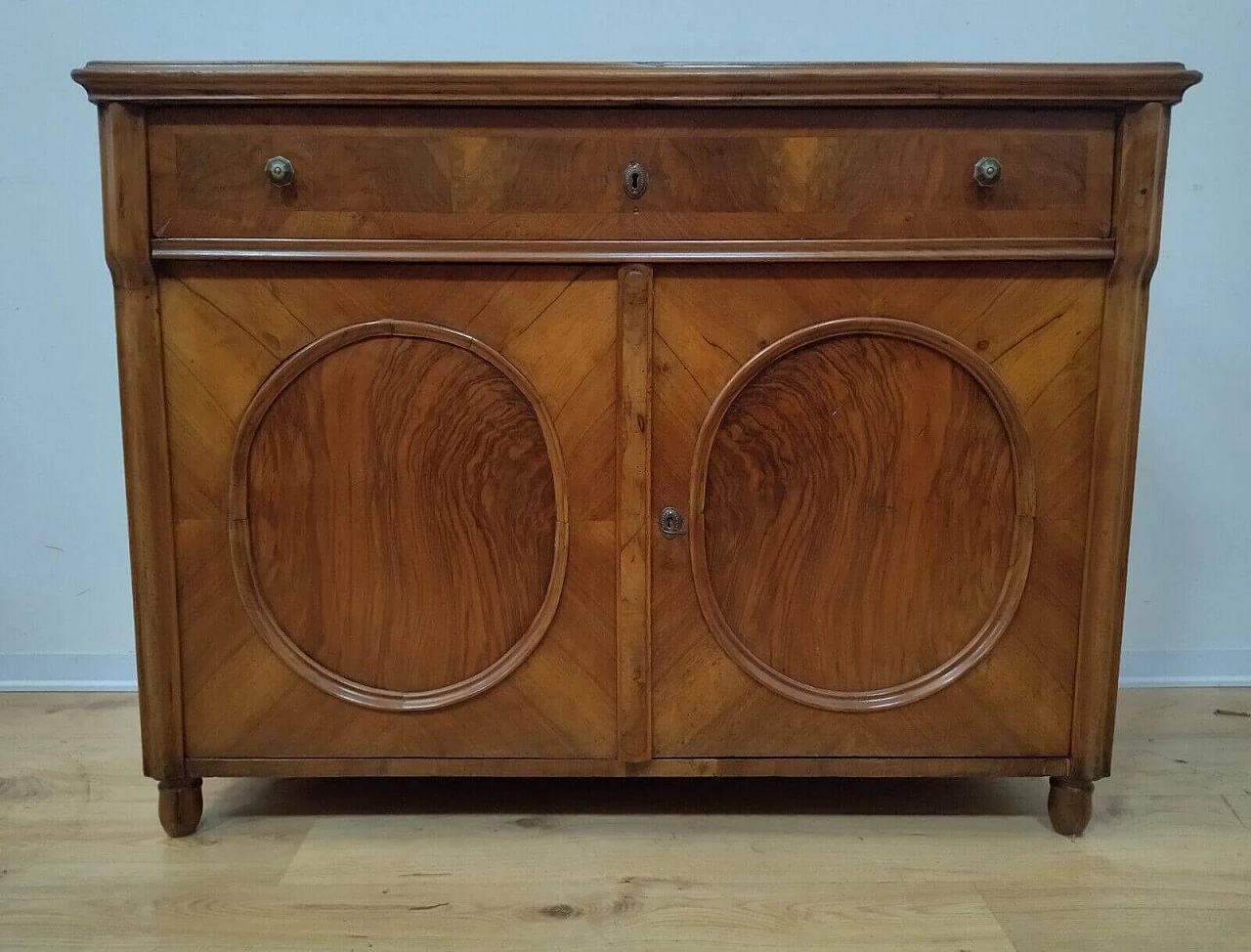 Walnut panelled sideboard with circular panelling, mid-19th century 1