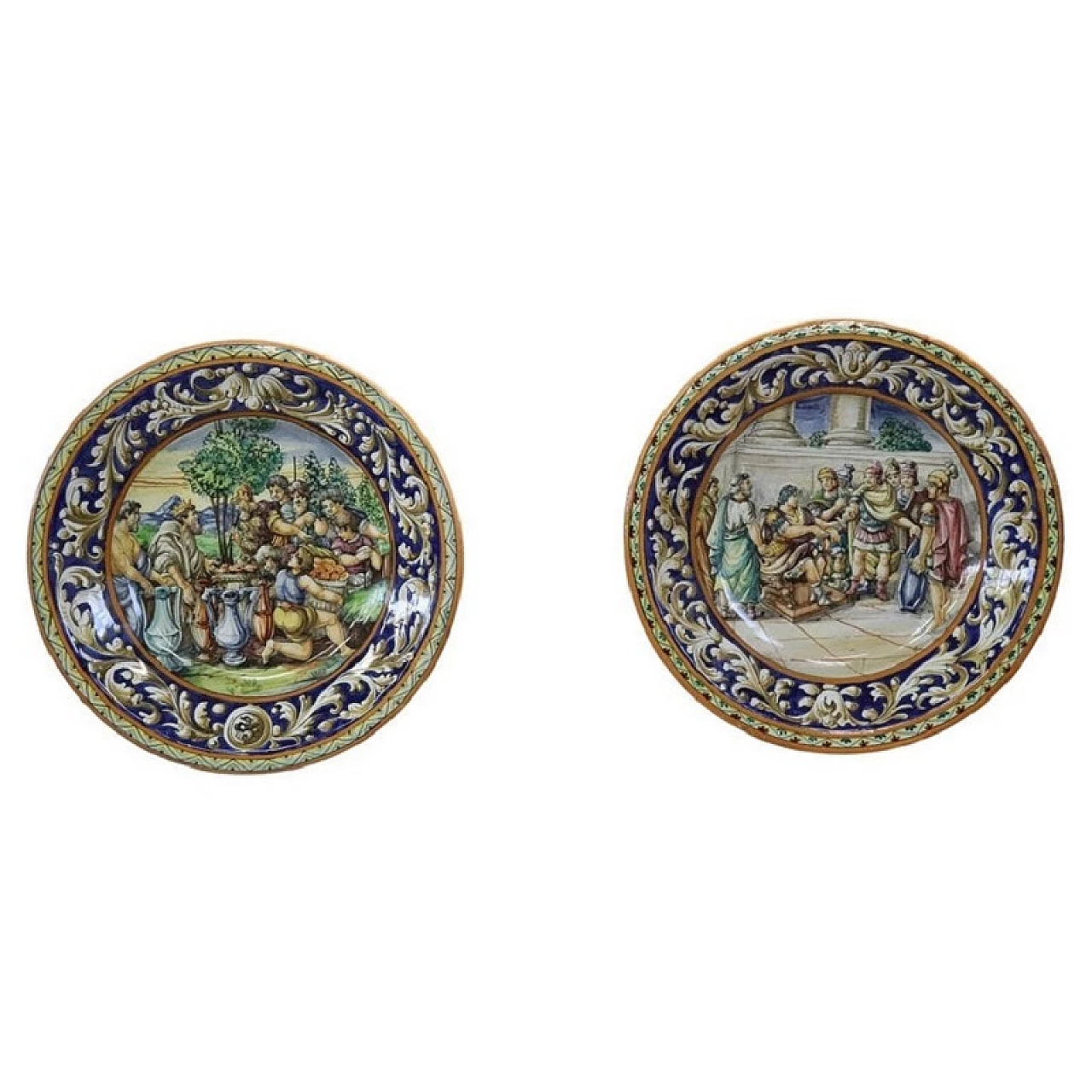 Pair of painted majolica wall plates, 19th century 1