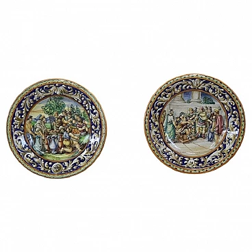 Pair of painted majolica wall plates, 19th century