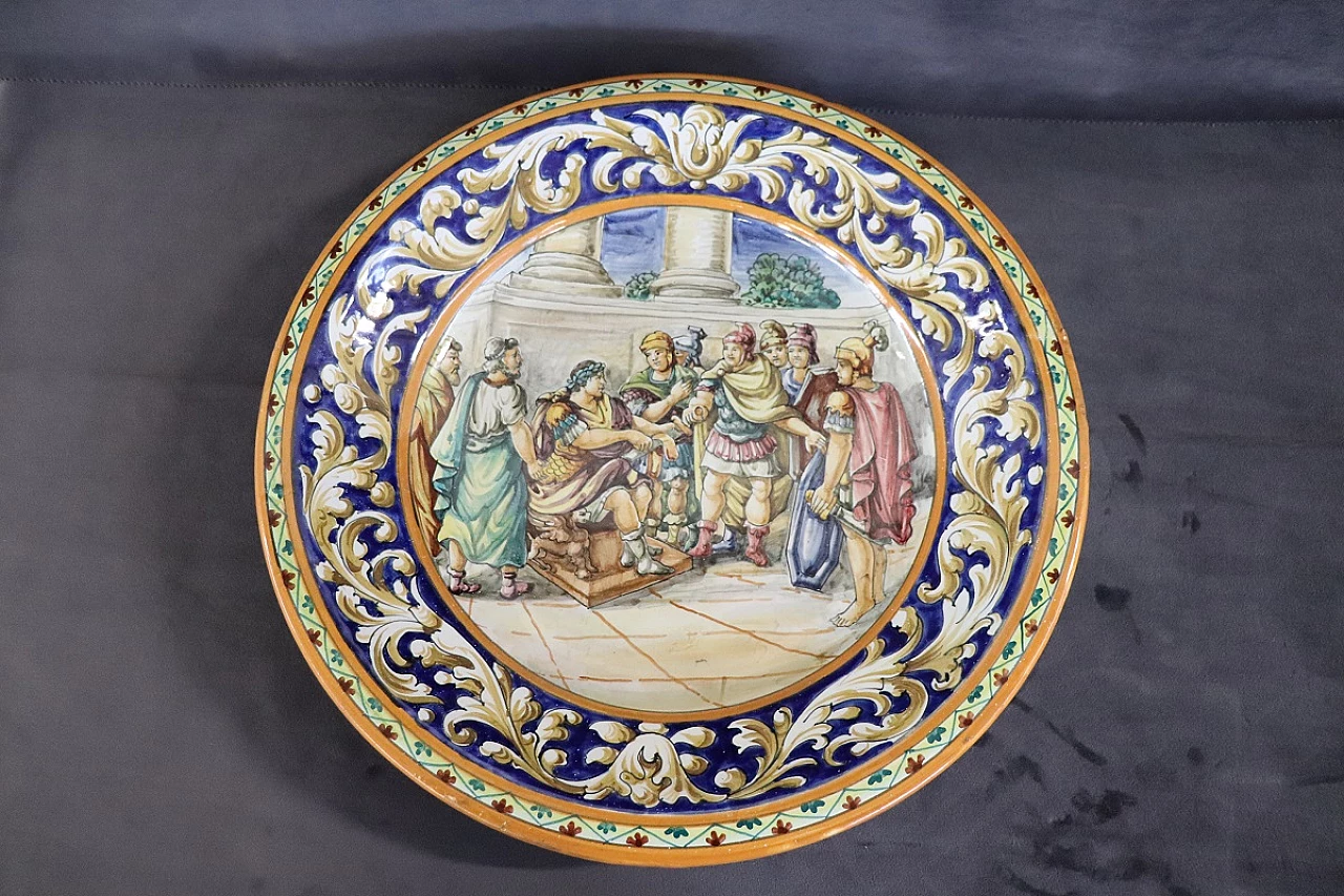 Pair of painted majolica wall plates, 19th century 13