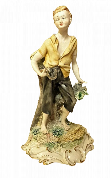 Volta, ragazzo con falcetto, scultura in ceramica di Capodimonte