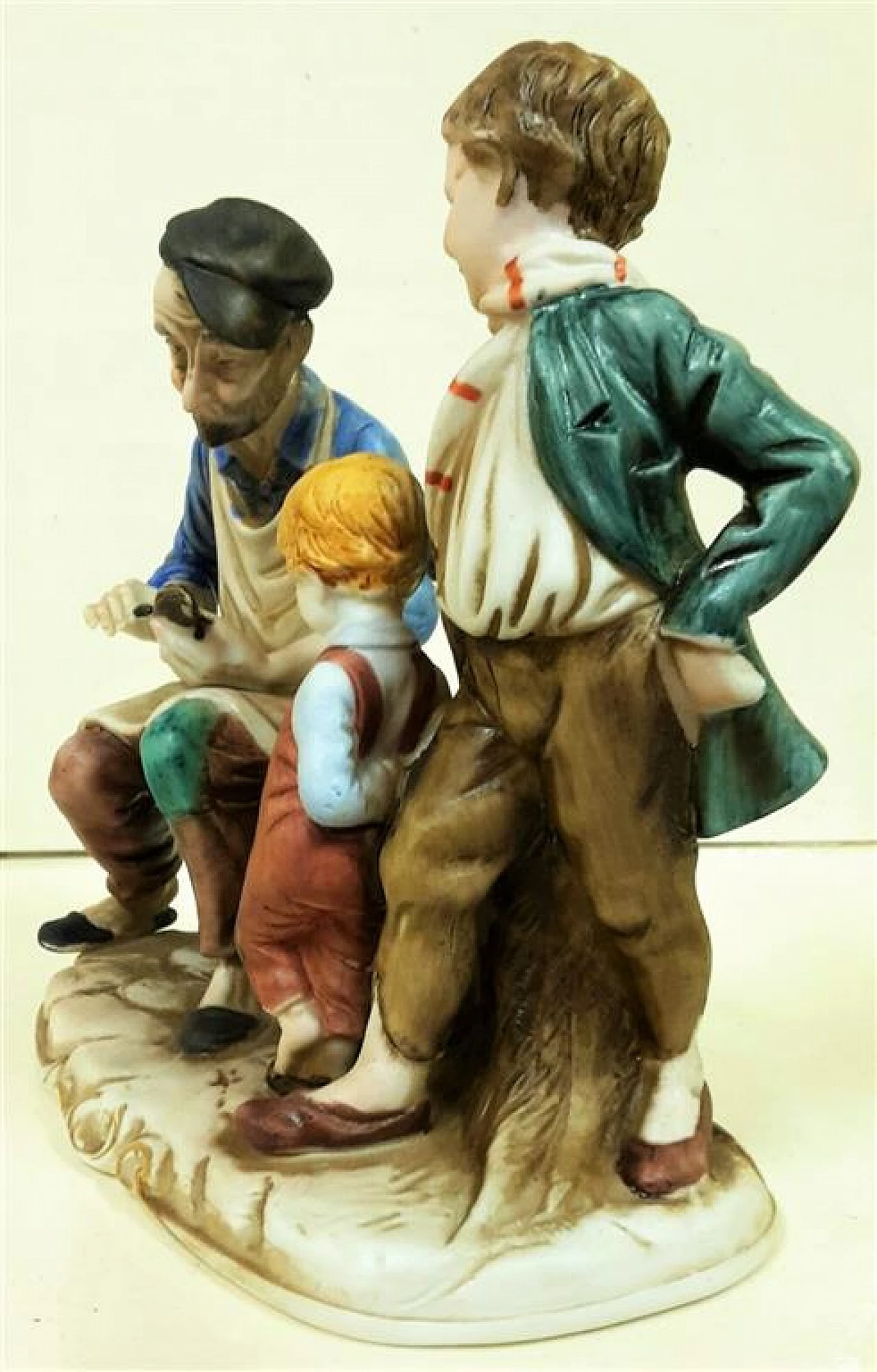 Shoemaker and children, ceramic sculpture 1