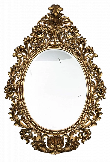 Florentine oval mirror in gilded and carved wood, late 19th century
