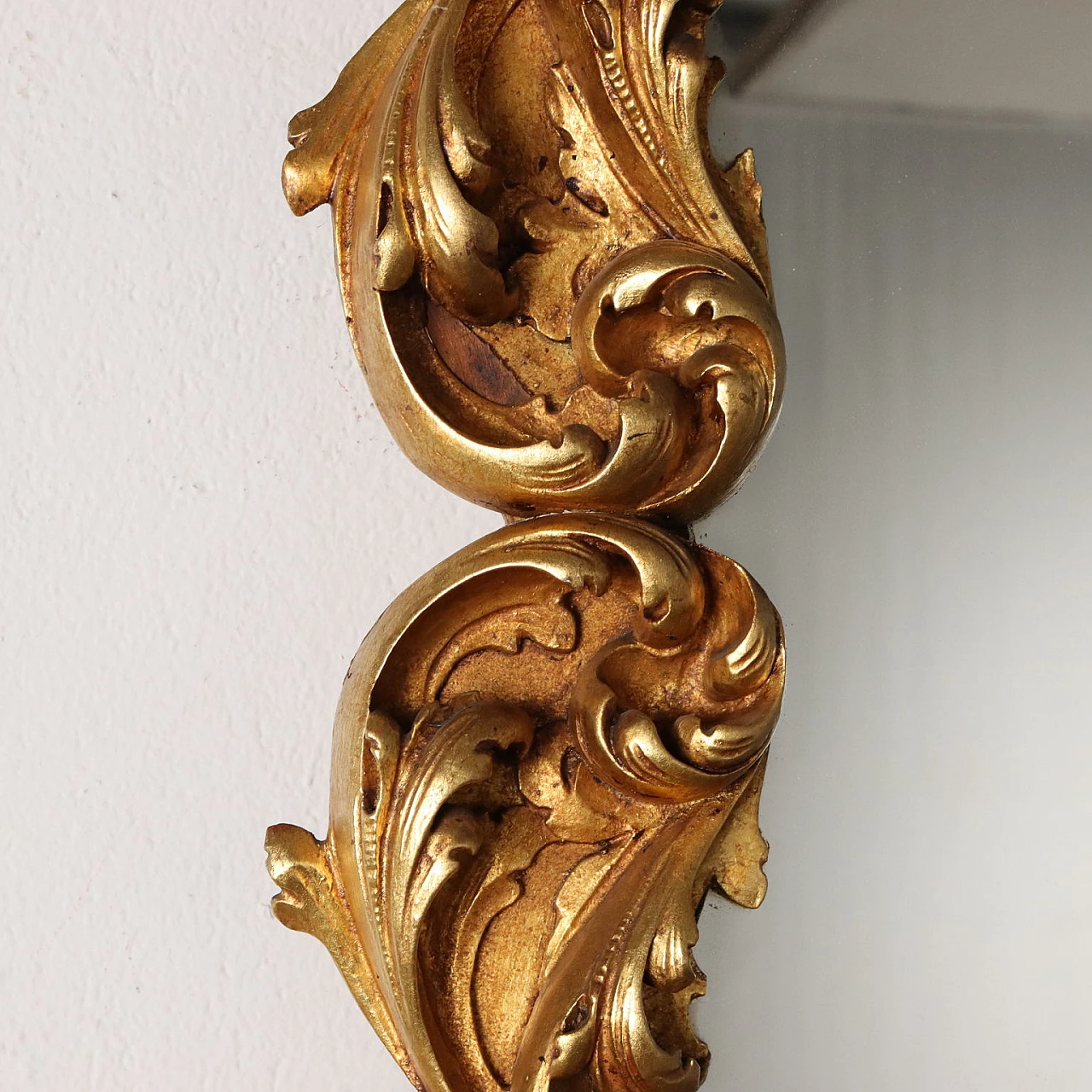 Mirror with frame carved with leaf scrolls and gilded 3