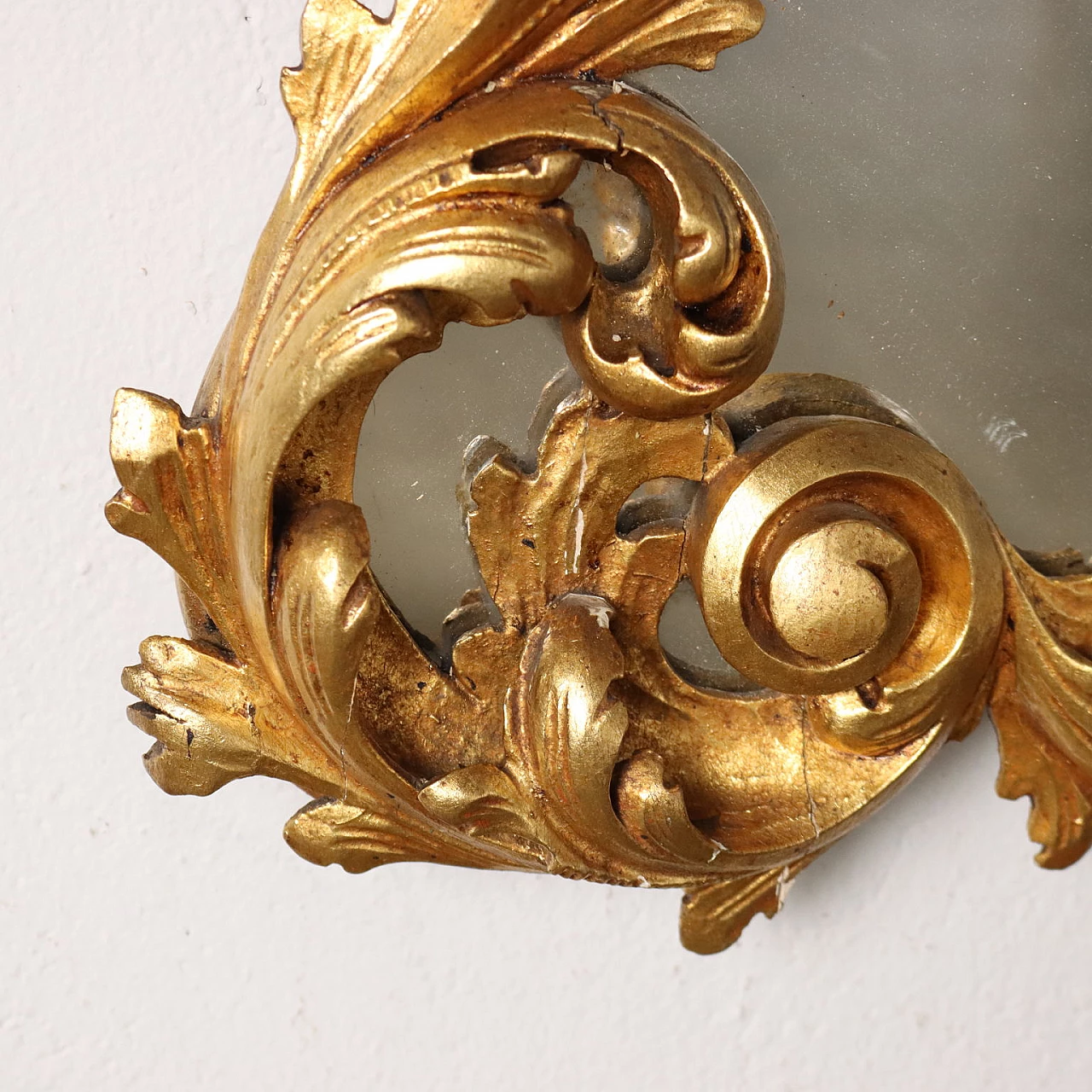 Mirror with frame carved with leaf scrolls and gilded 5