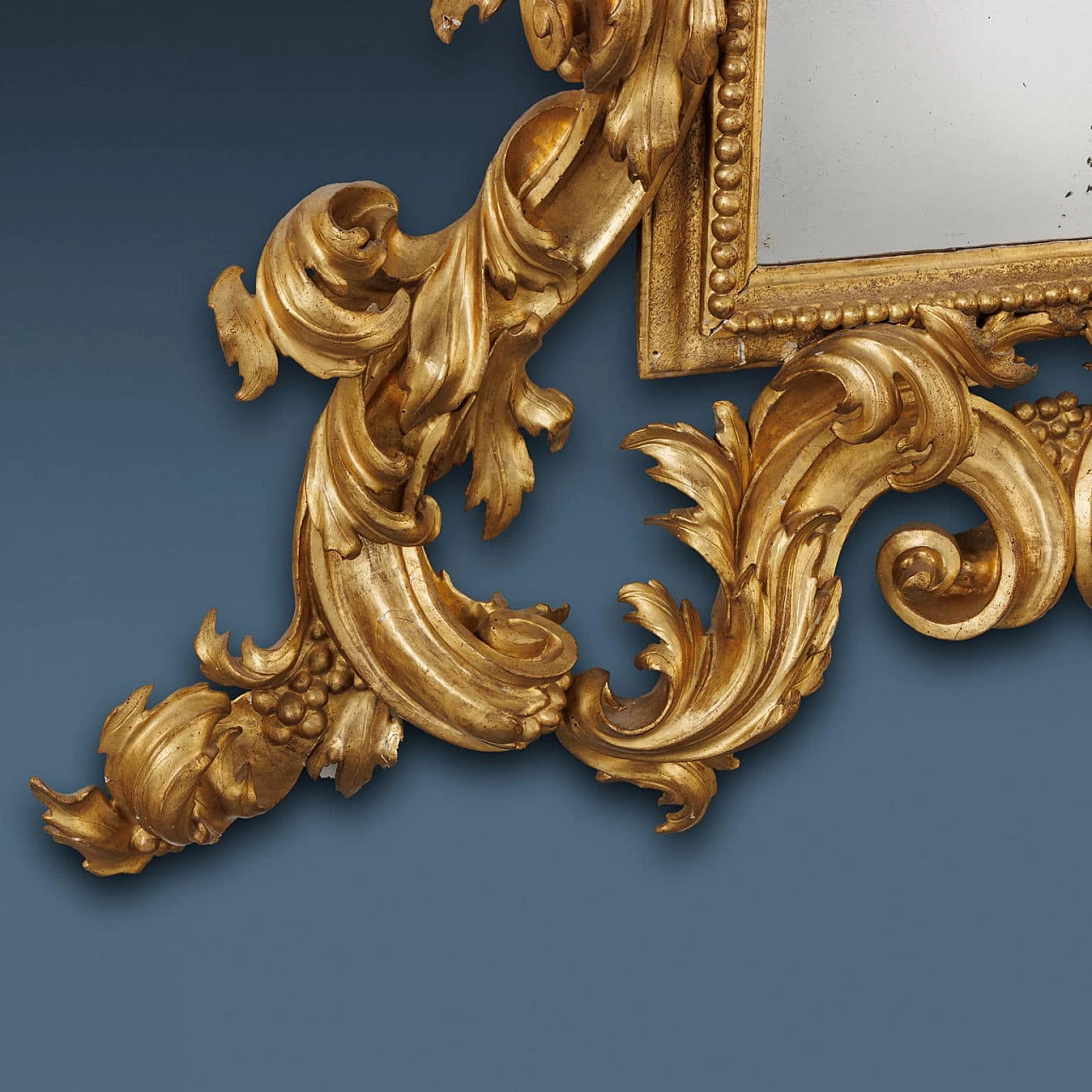 Carved and gilded mirrorboard, early 18th century 4