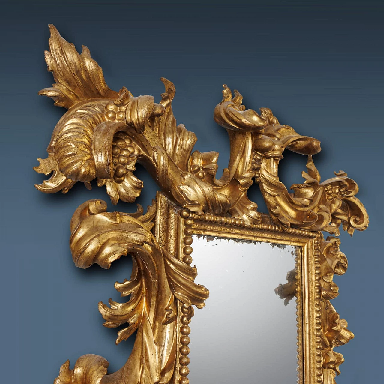 Carved and gilded mirrorboard, early 18th century 5