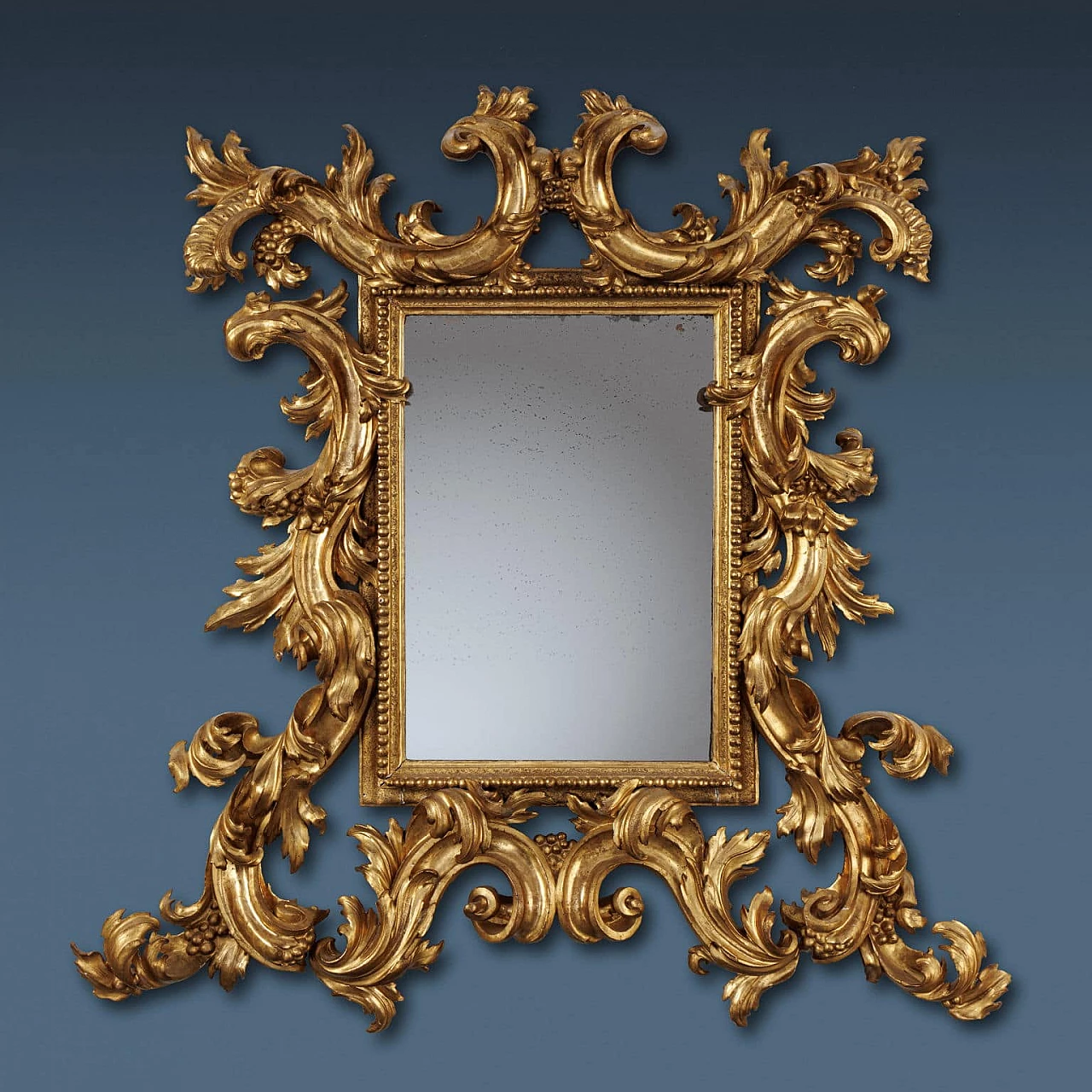 Carved and gilded mirrorboard, early 18th century 7