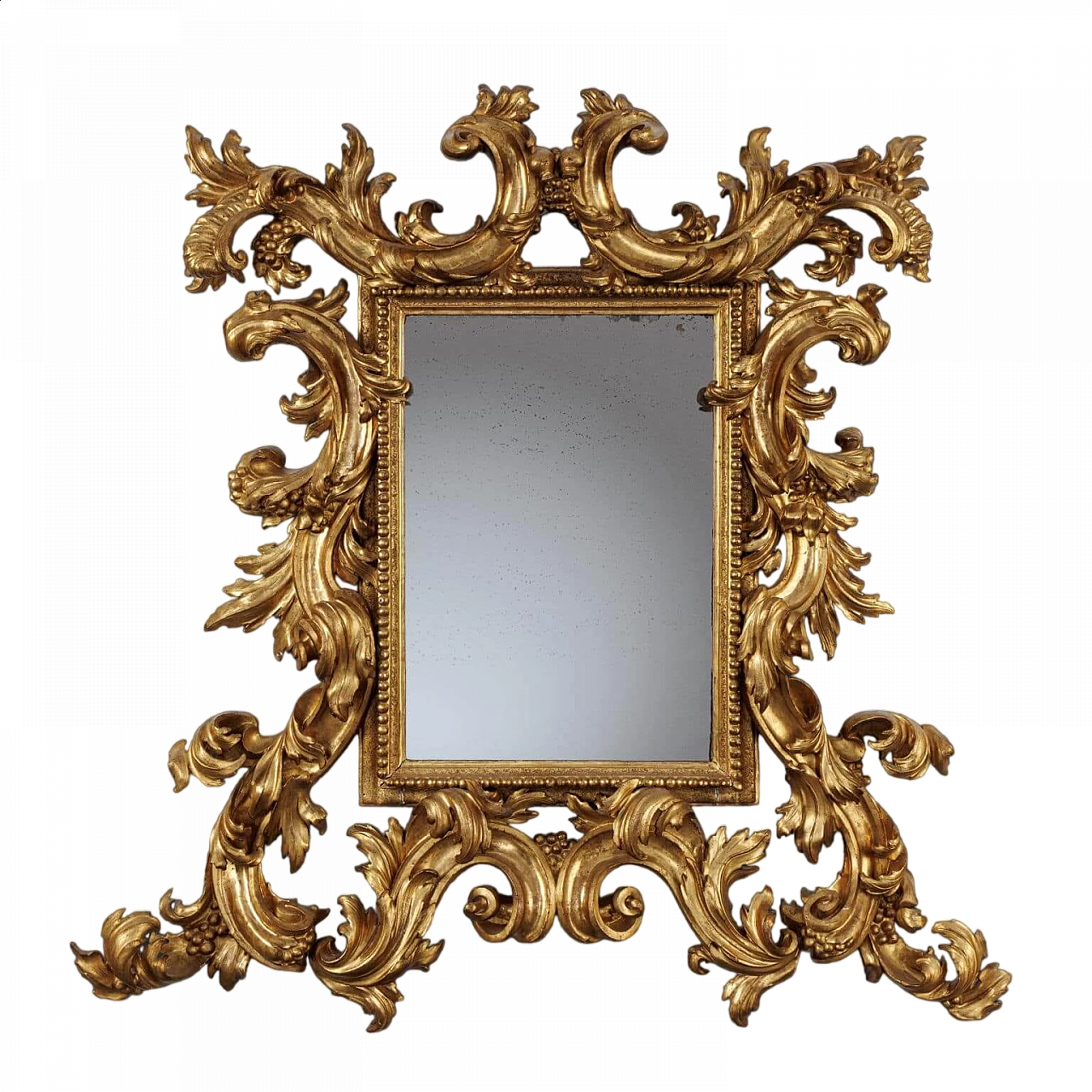 Carved and gilded mirrorboard, early 18th century 8