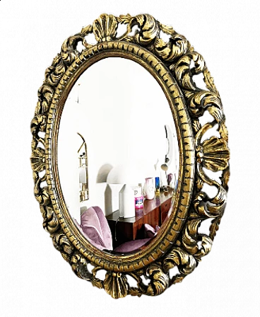 Specchio ovale stile Barocco in legno dorato e intagliato