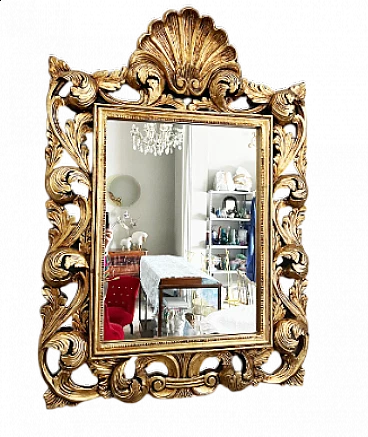 Baroque style gilded and carved wood wall mirror