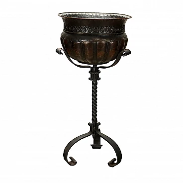 Wrought iron planter with three curled feet, late 19th century