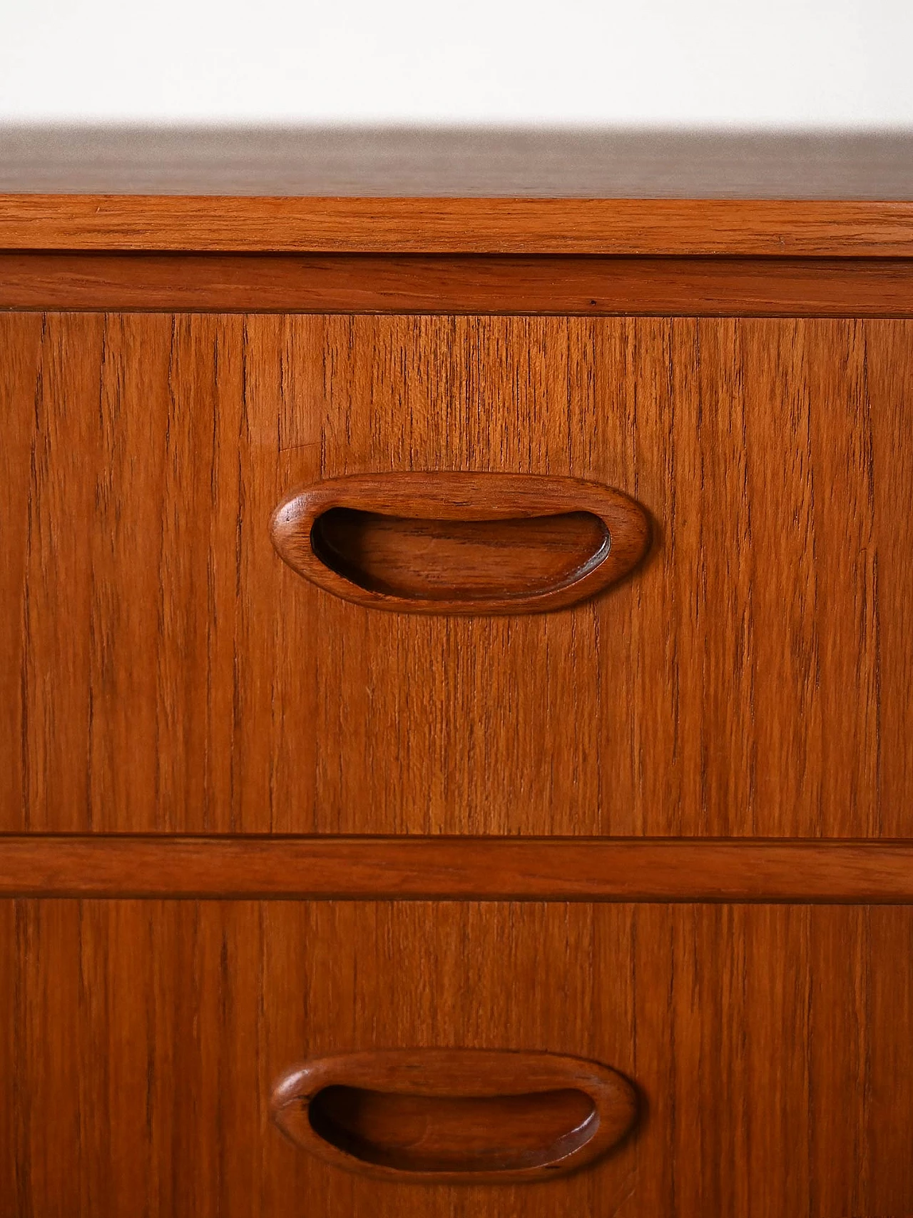 Teak chest of drawers with golden details, 1960s 7