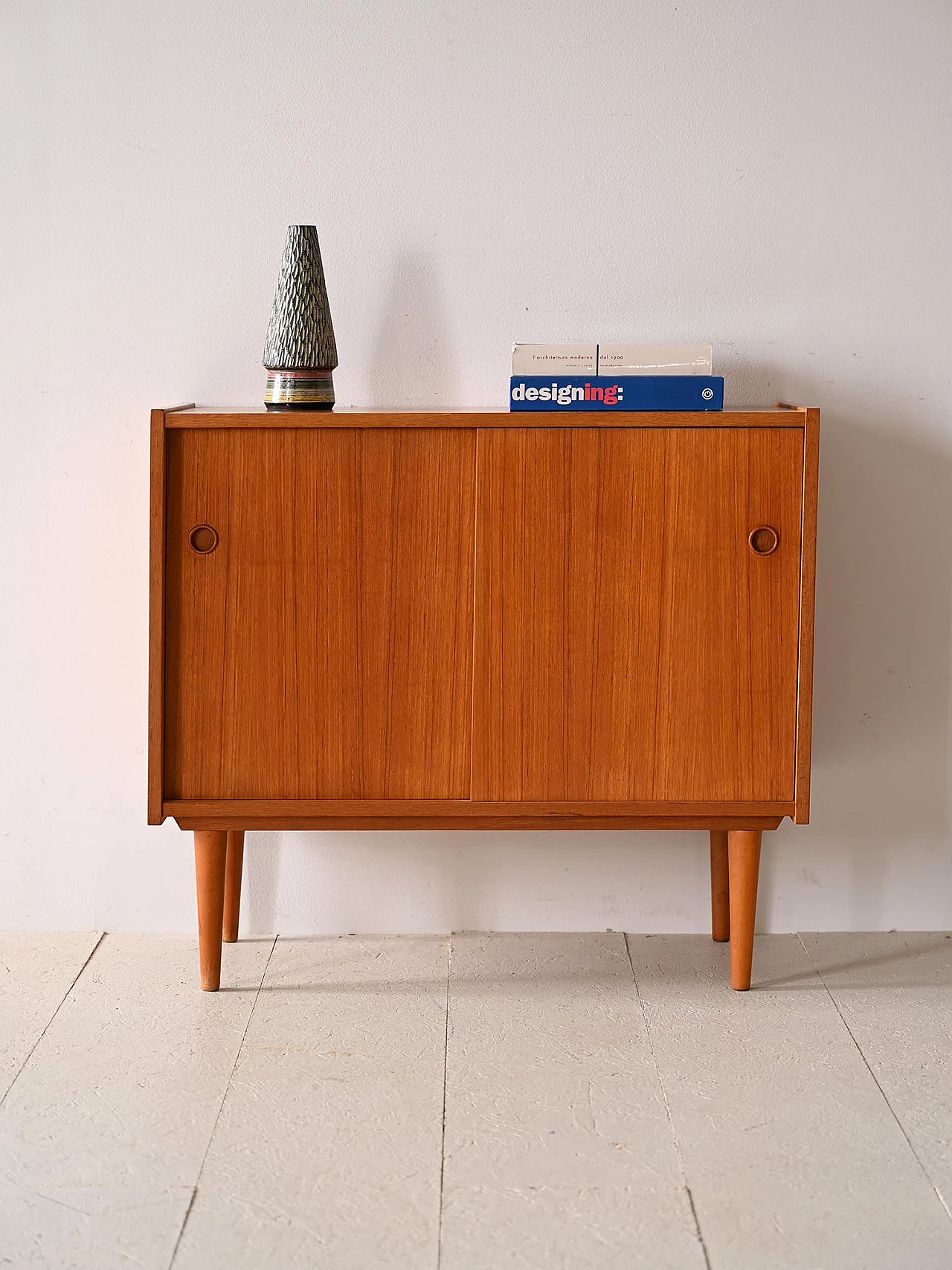 Teak sideboard with sliding doors with cone-shaped legs, 1960s 1