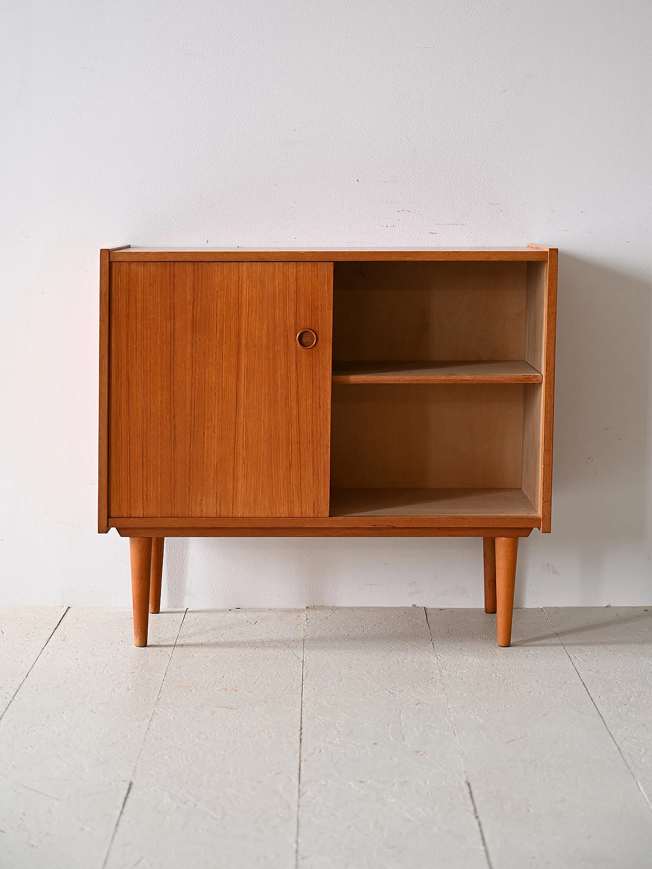 Teak sideboard with sliding doors with cone-shaped legs, 1960s 3