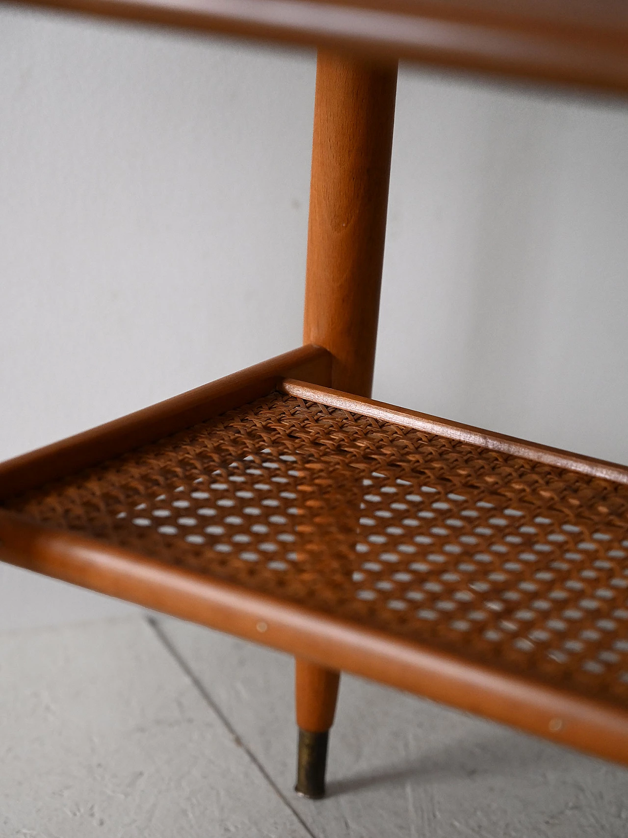 Teak coffee table with wheels and rattan magazine rack, 1960s 7