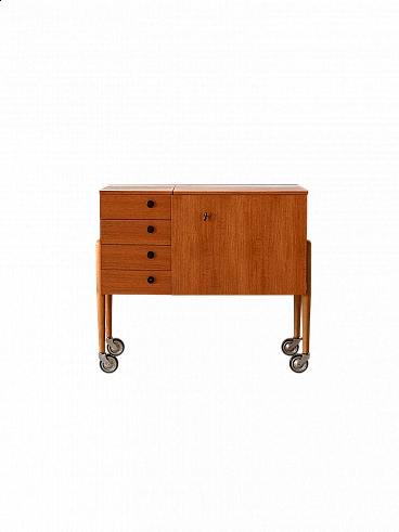 Teak sewing cabinet with drawers and wheels, 1960s