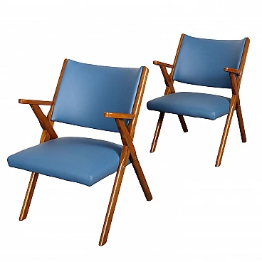 Pair of armchairs in stained beechwood and light blue skai, 1950s