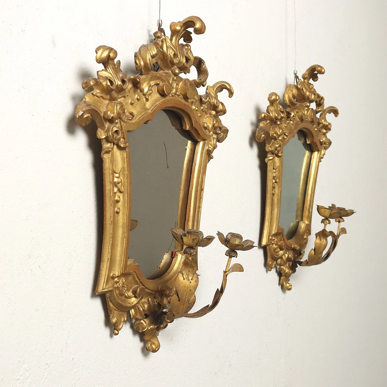 Pair of Baroque embossed sheet metal mirrors with lamp-holding arms, early 18th century 3