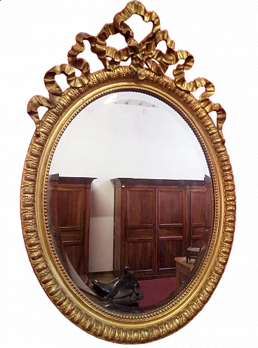 Specchio ovale in legno e gesso dorati con nodo d'amore, metà '800