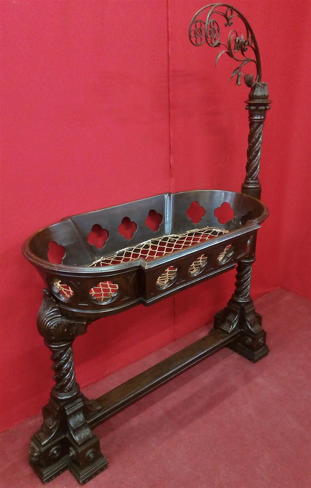 Carved wood and wrought iron cradle, early 20th century 1